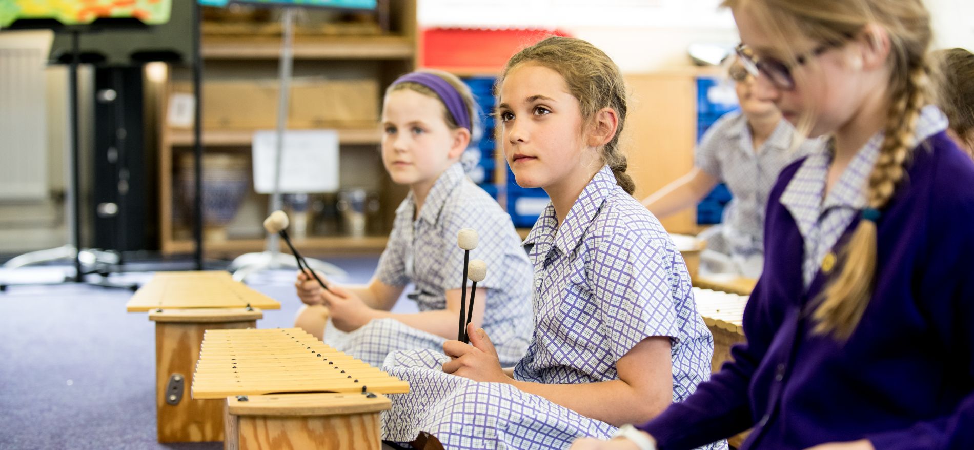 school girls in music lesson